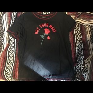 Black t-shirt with rose “Not Your Muse”